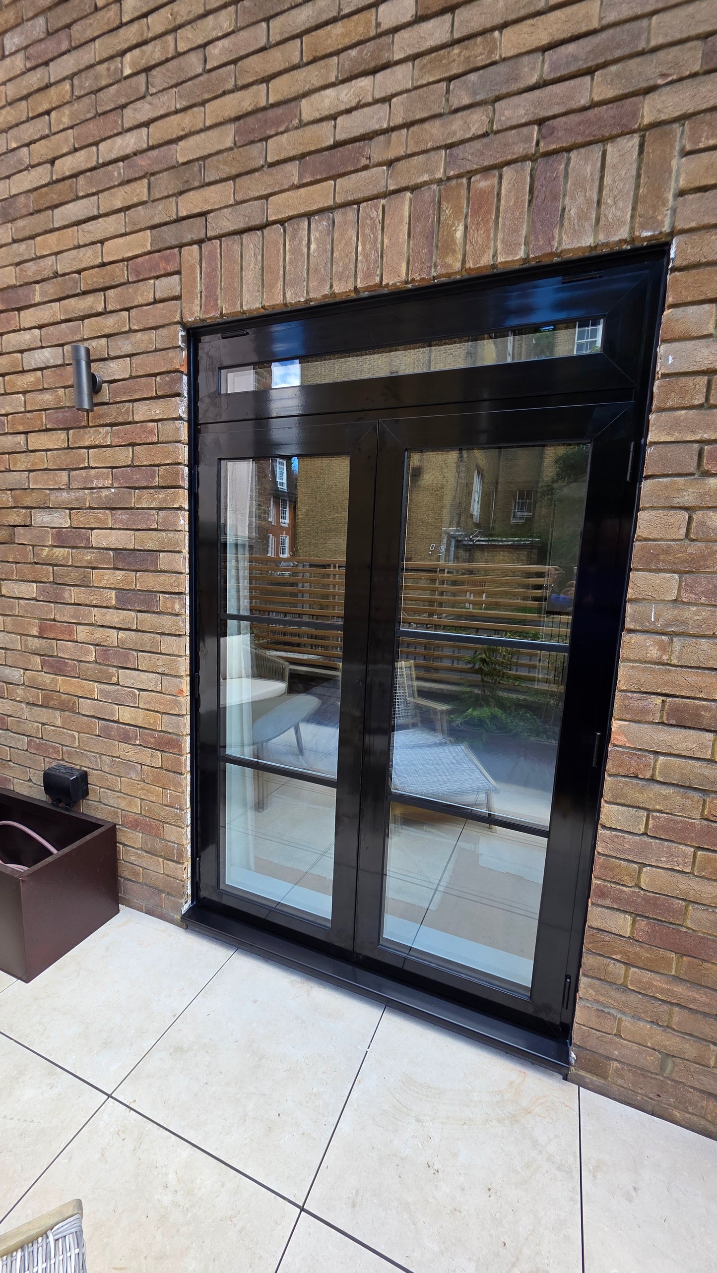 Black aluminium French doors - after installation